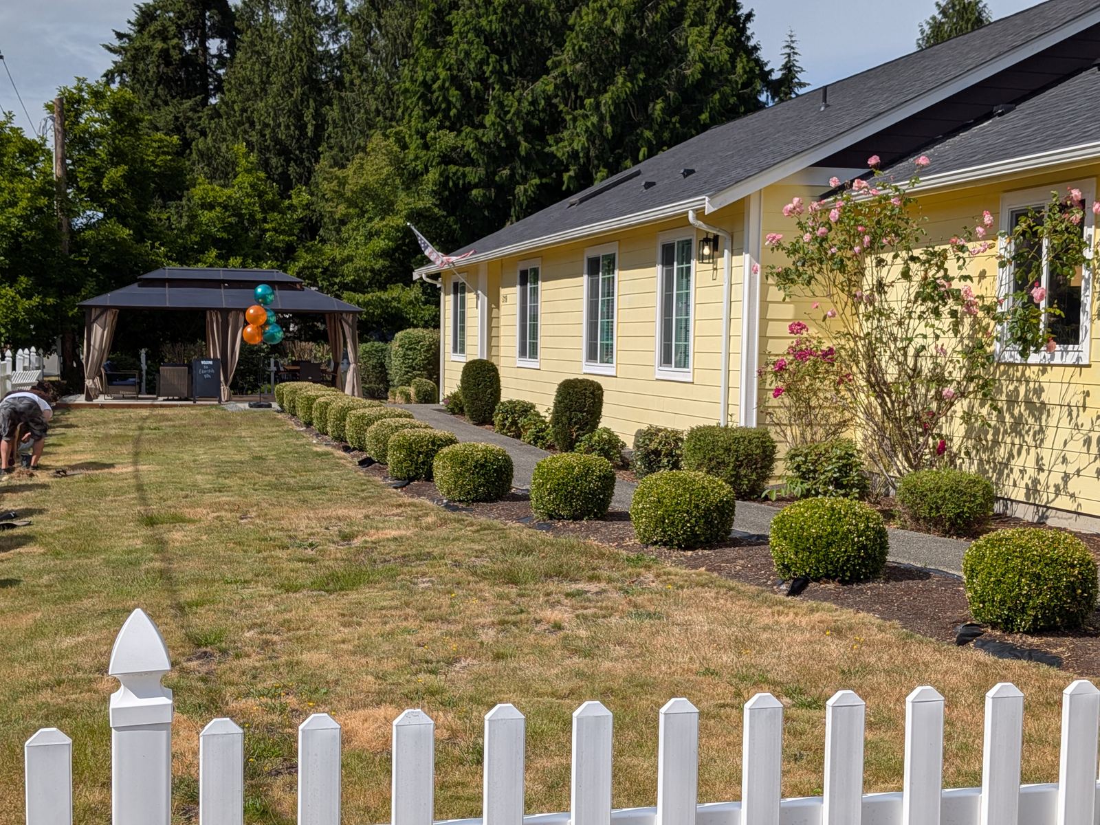 Beautifully maintained front gardens and landscaping at Edmonds Villa senior care home
