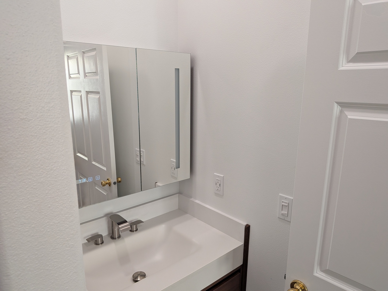 Accessible bathroom with safety grab bars at Edmonds Villa — designed for senior resident safety