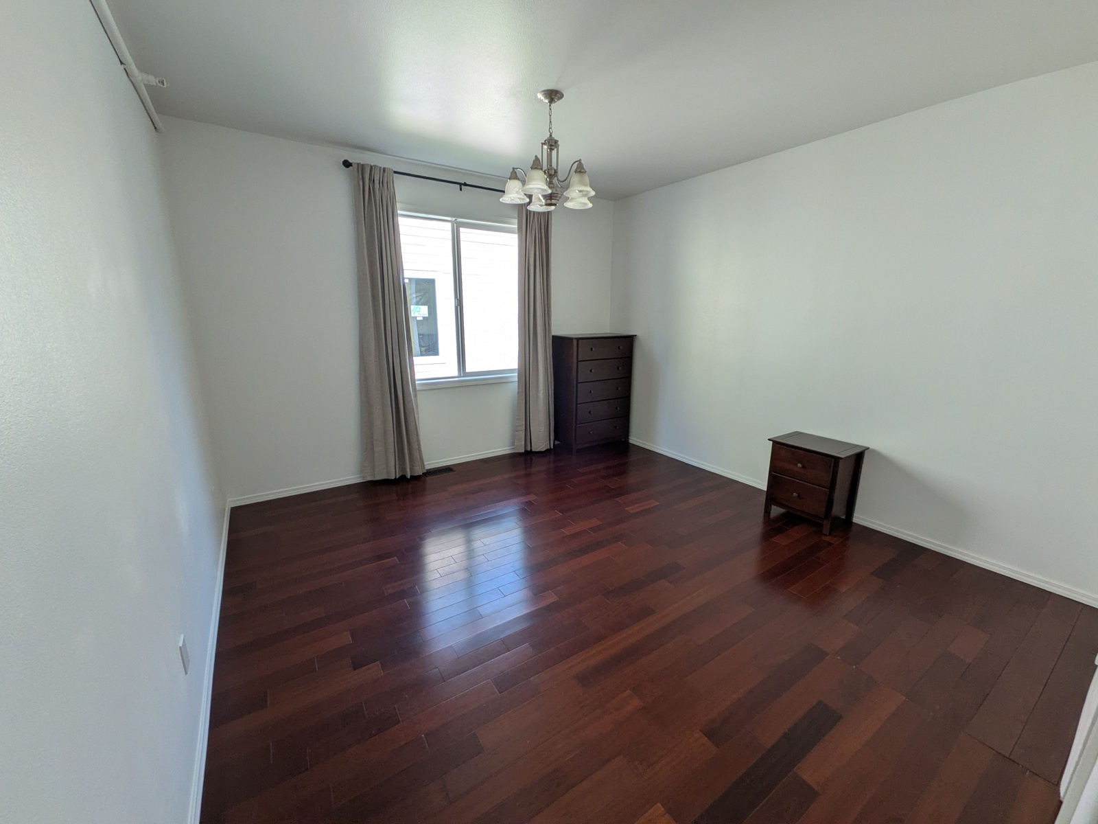 Warm and inviting private bedroom at Edmonds Villa adult family home with ensuite bathroom access