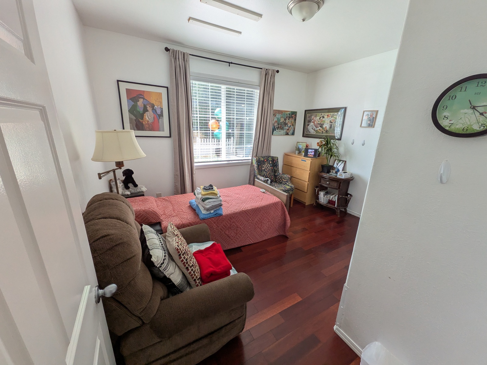 Cozy private bedroom with natural light at Edmonds Villa — comfortable space for senior residents