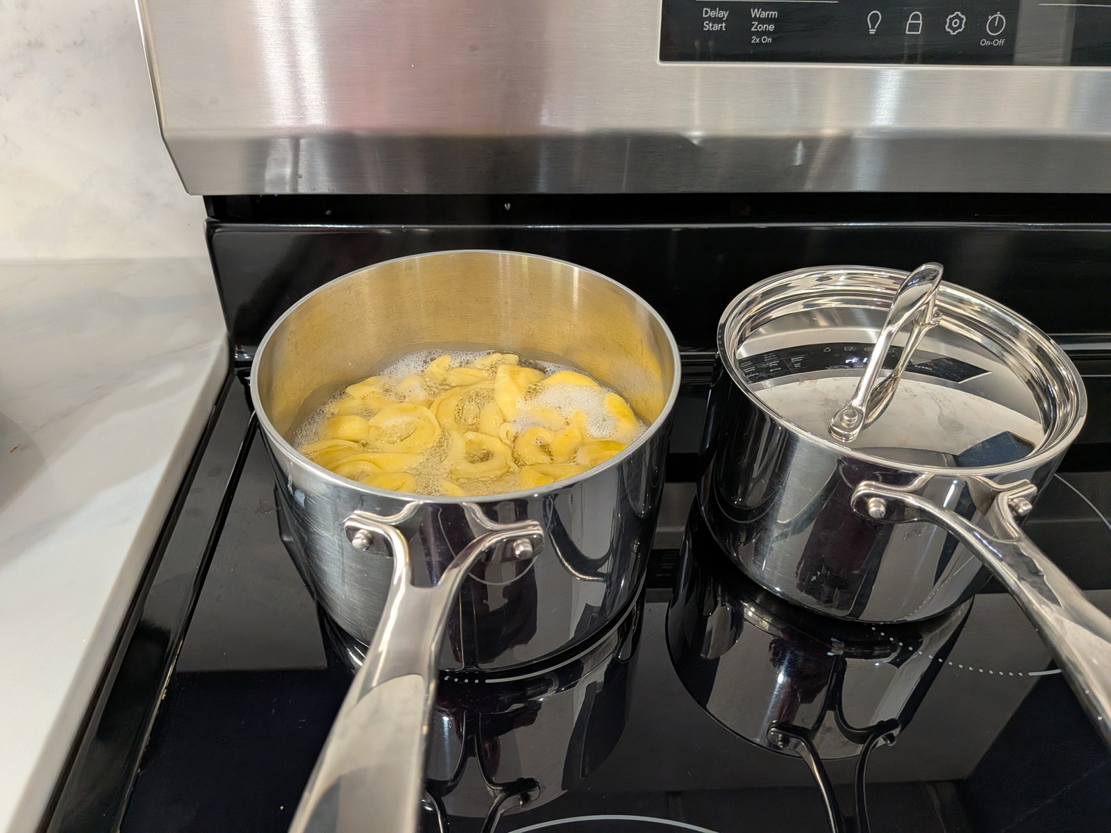 Home-cooked tortellini meal preparation at Edmonds Villa — nutritious food for high-acuity residents