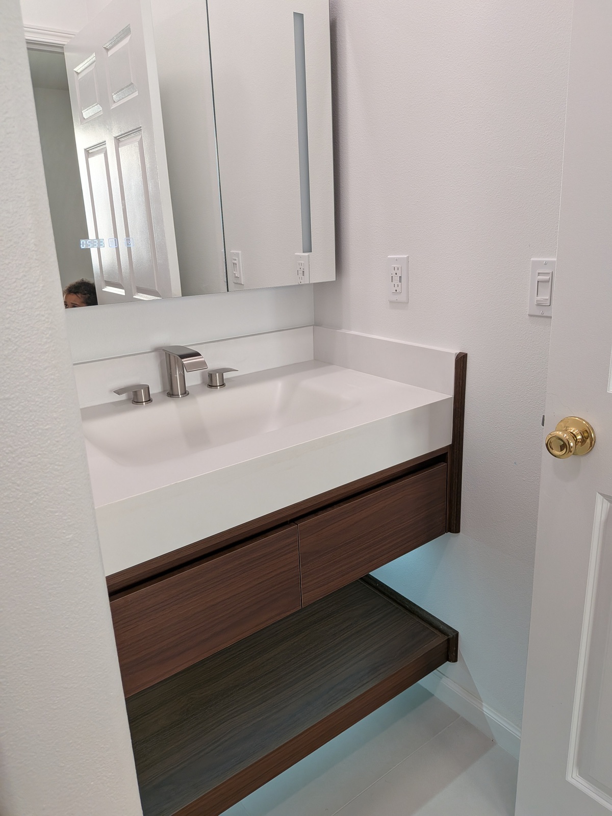 Accessible bathroom vanity with wheelchair clearance at Edmonds Villa adult family home