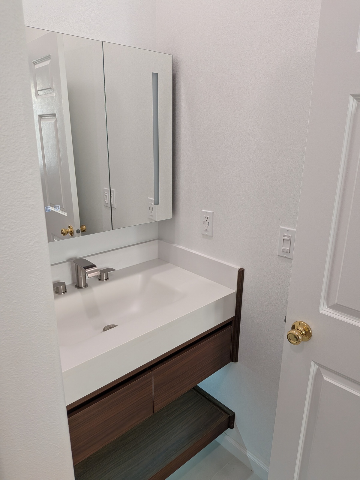 Accessible bathroom with safety grab bars at Edmonds Villa — designed for senior resident safety