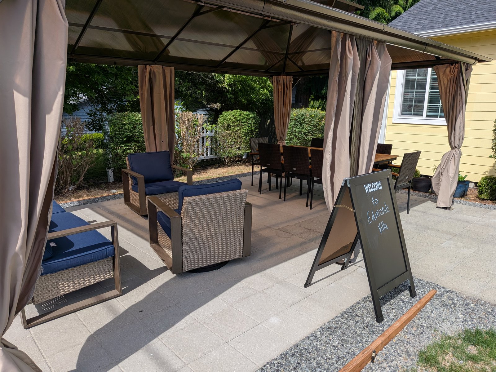 Shaded gazebo patio seating area at Edmonds Villa — outdoor space for senior residents