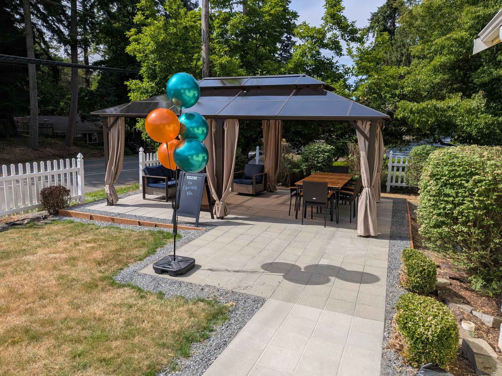 Peaceful backyard patio seating area at Edmonds Villa adult family home for relaxation