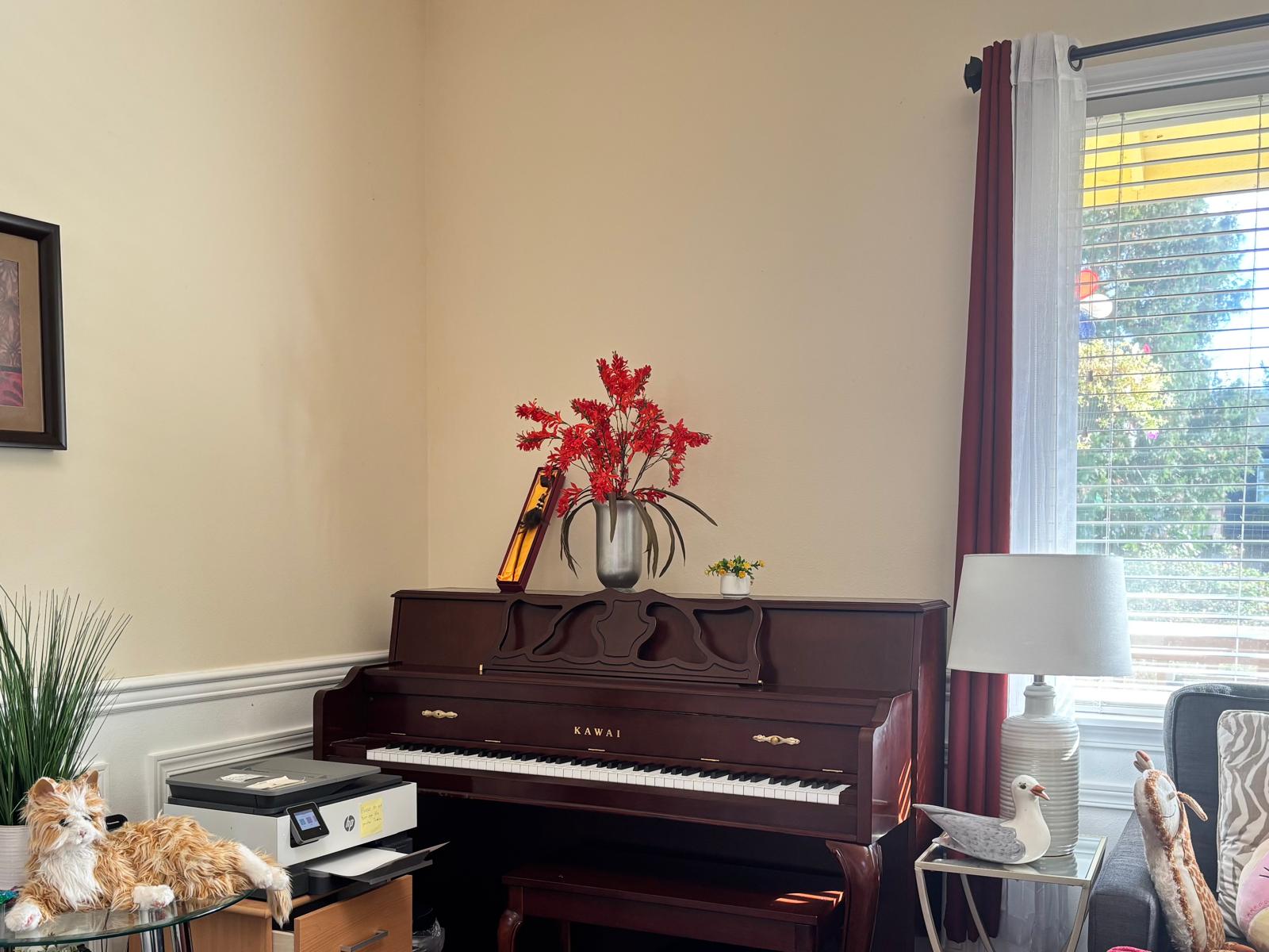 Edmonds Villa living area with piano - homelike environment for residents